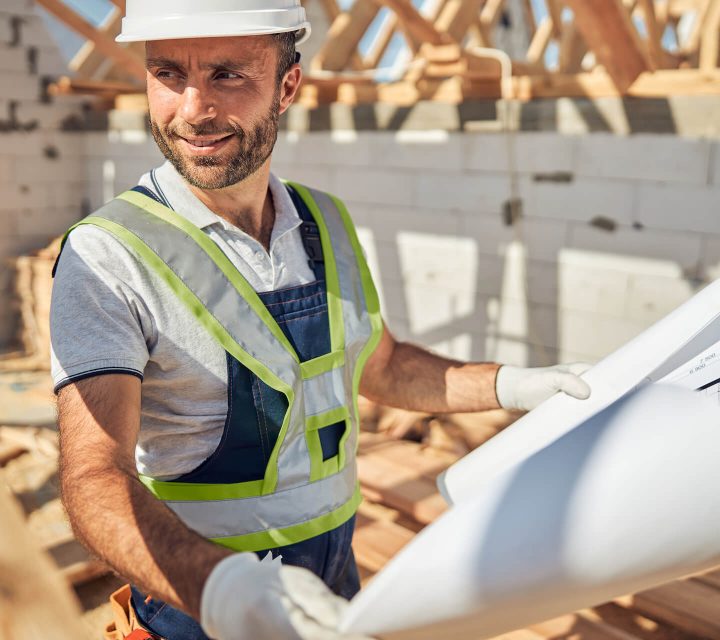 cheerful-young-architect-working-at-big-project-2021-09-03-21-02-38-utc.jpg